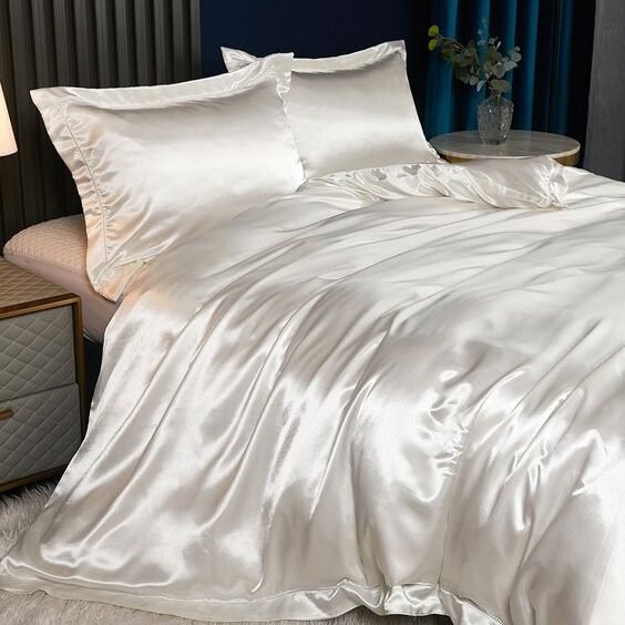 Princess bed with white silk sheets